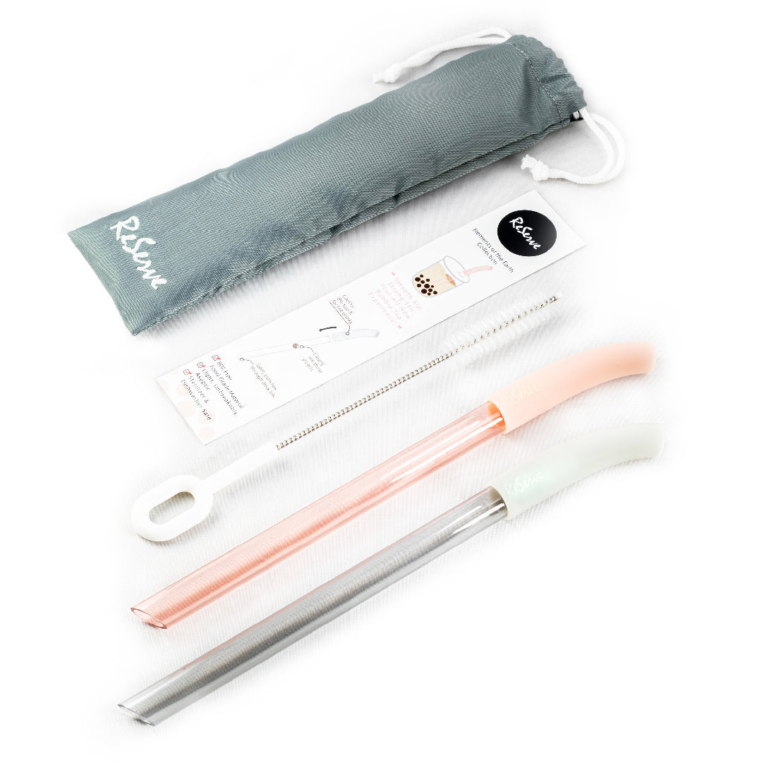 A set of 2 bubble tea straws: silver and rose gold colors. Comes with cleaning brush and reusable bag.