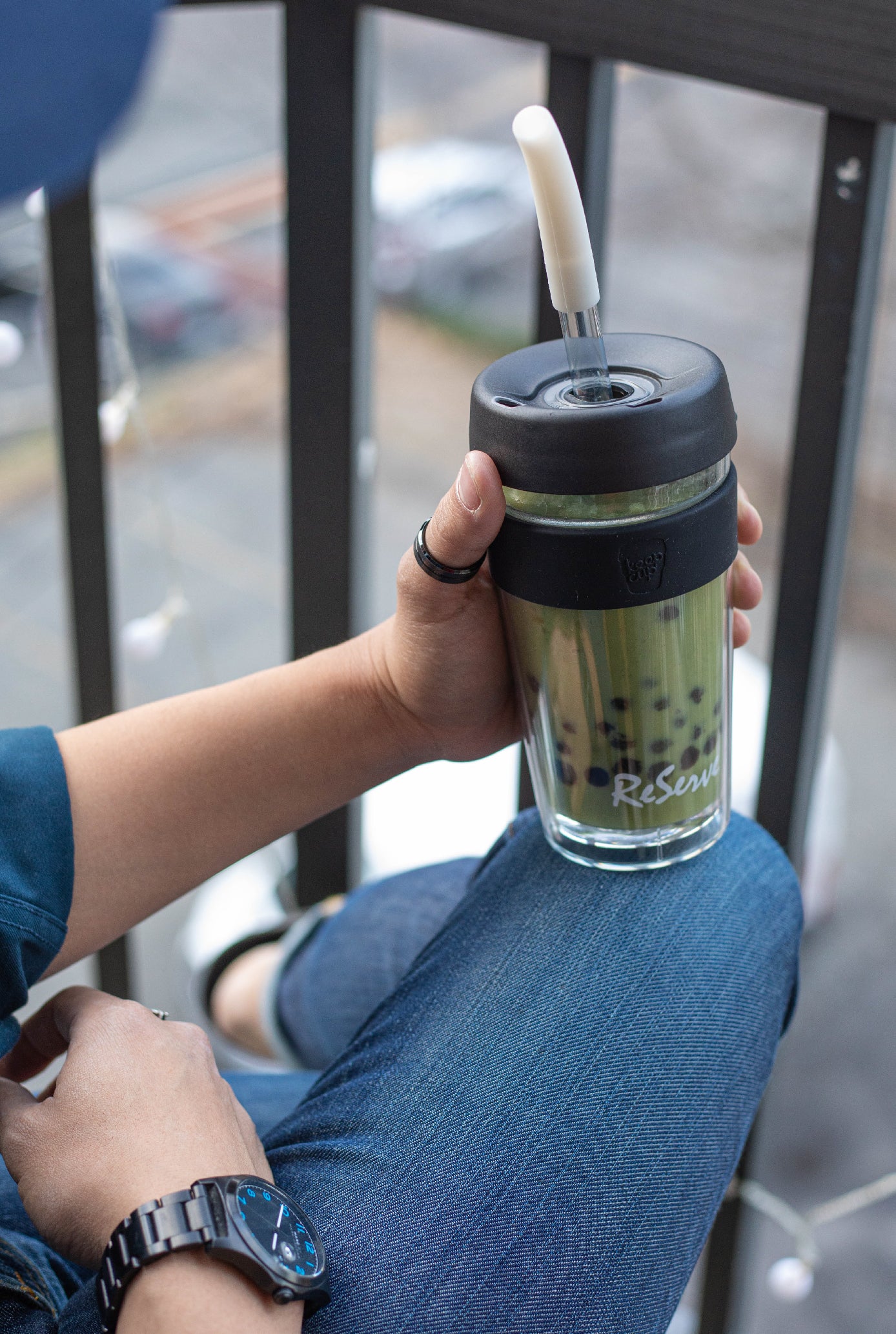 Silver bubble tea straw in ReServe KeepCup of  matcha milk tea with boba/pearl