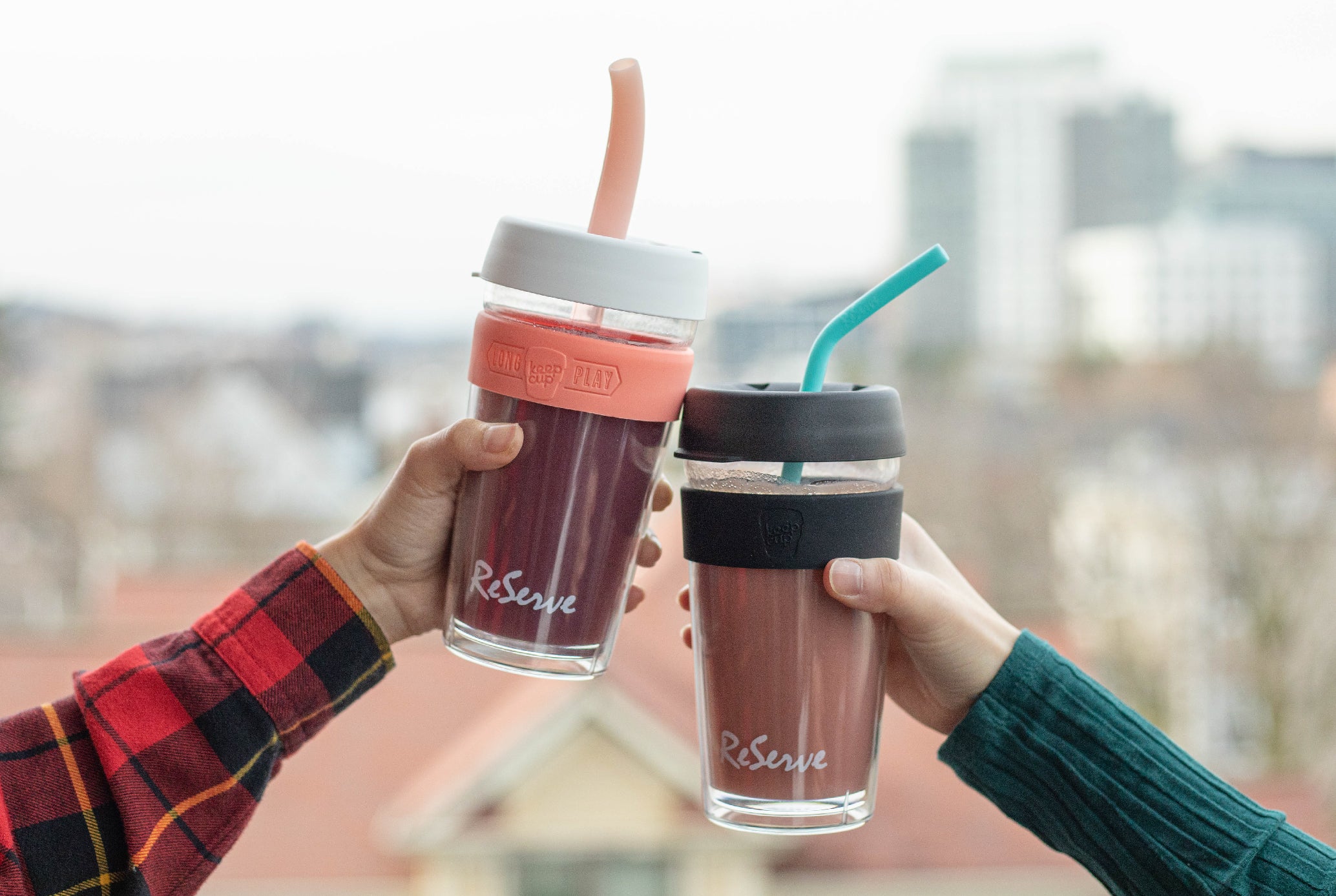 Two smoothie drinks in the ReServe Black Band KeepCup &amp; Pink Band KeepCup. The cups feature Rose Gold Smoothie Straw and Blue Island Paradise duo-hardness silicone straw.